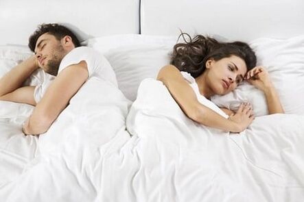 A man with weak potency and a disappointed woman in bed